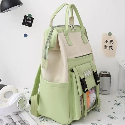 Le sac à dos vert place les filles durables de cartable d'étudiants d'ordinateur portable