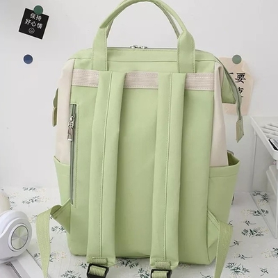 Le sac à dos vert place les filles durables de cartable d'étudiants d'ordinateur portable