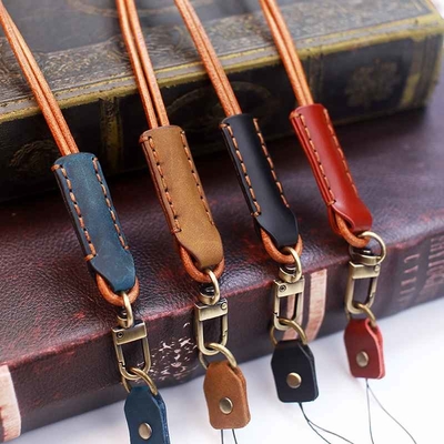 Courroie universelle de téléphone de Lanyard Strap Adjustable Leather Neck de téléphone d'OEM avec le métal de correction